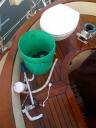 The bowl, the base (upper right) and parts in a bucket